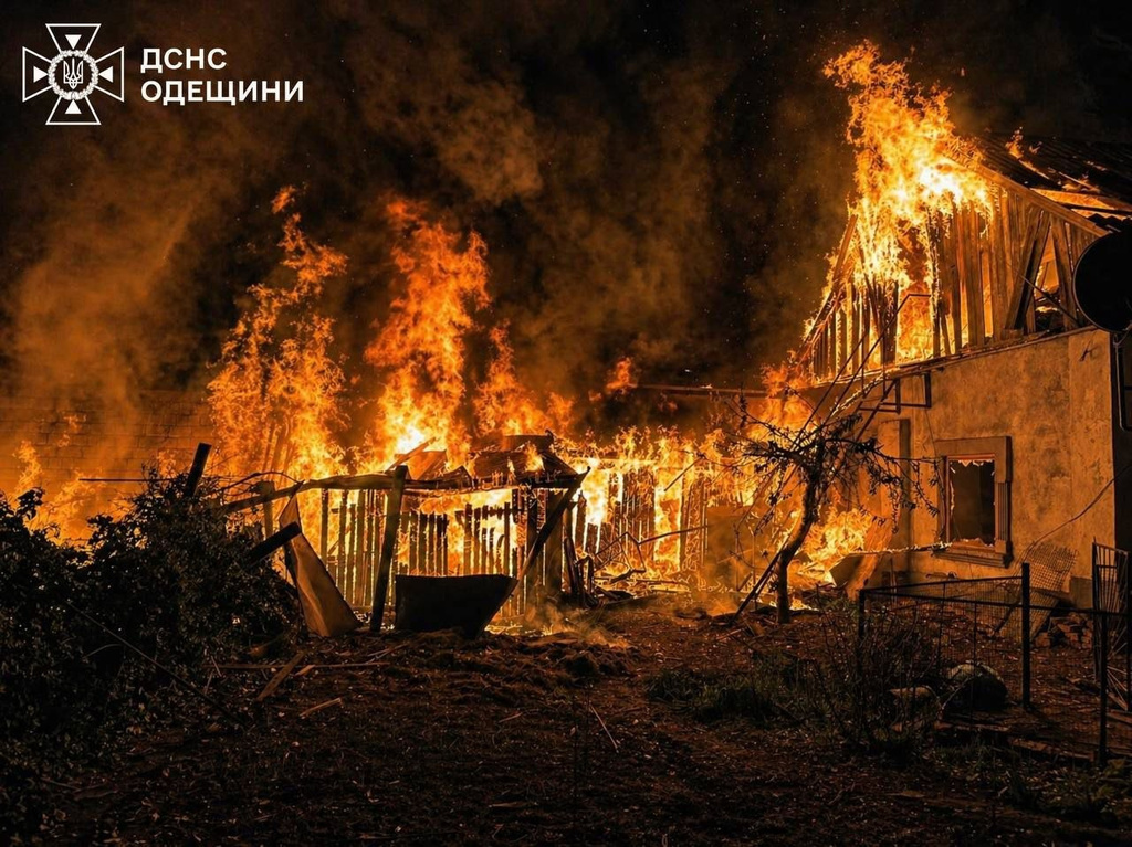 In this photo provided by the Ukrainian Emergency Services on Wednesday, April 29, 2026, residential buildings burn following a Russian drone strike on Odesa region, Ukraine. (Ukrainian Emergency Service via AP)