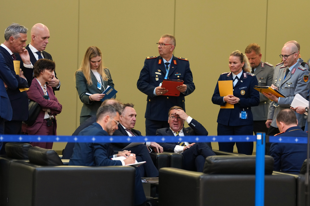 Germany's Defense Minister Boris Pistorius, center right, speaks with Norway's Defense Minister Tore Sandvik, center left, prior to a meeting of the North Atlantic Council in defense ministers format at NATO headquarters in Brussels, Thursday, June 18, 2026. (AP Photo/Virginia Mayo)