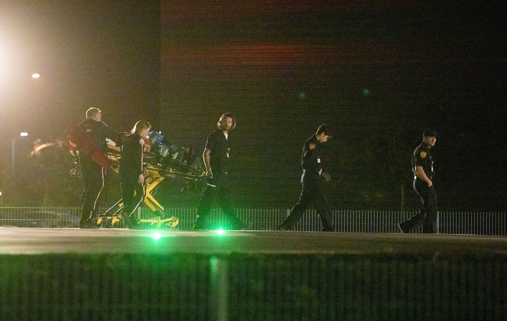 FILE - Emergency crews arrive with supplies at Sutter Santa Rosa Regional Hospital to evacuate patients in Santa Rosa, Calif., on Oct. 26, 2019. (AP Photo/Ethan Swope, file)