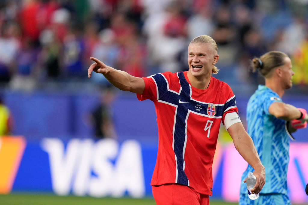 Norway's Erling Haaland (9) smiles as he leaves the pitch at the end of the World Cup Group I soccer match between Iraq and Norway in Foxborough, Mass., near Boston, Tuesday, June 16, 2026. (AP Photo/Charles Krupa)