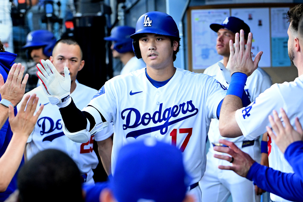 Los Angeles Dodgers Shohei Ohtani (17) celebrates his solo home run against the Seattle Mariners during the first inning of a baseball game Tuesday, July 28 2026, in Los Angeles. (AP Photo/Wally Skalij)