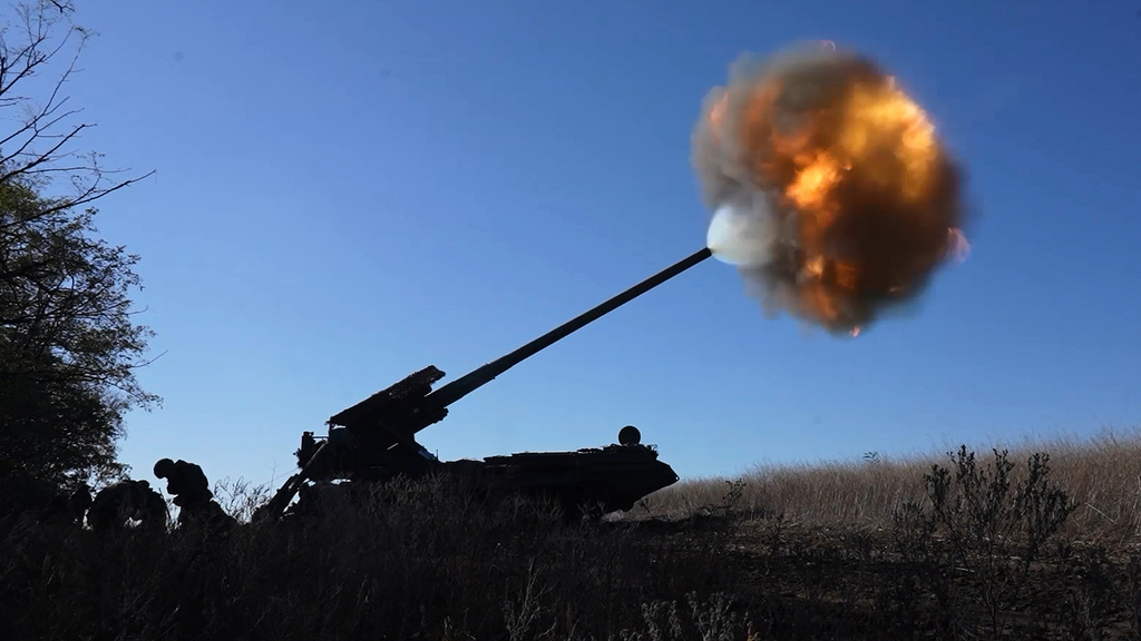 In this image, made from video and provided by Russian Defense Ministry Press Service on Thursday, Nov. 6, 2025, Russian soldiers fire a Malka self-propelled gun towards Ukrainian positions on an undisclosed location in Ukraine. (Russian Defense Ministry Press Service via AP)