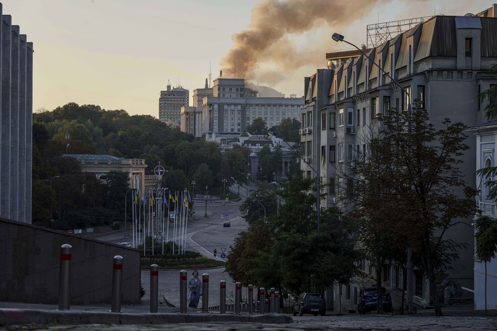 Smoke rises from the Cabinet of Ministers building after a Russian strike in Kyiv, Ukraine, on Sunday, Sept. 7, 2025. (AP Photo/Evgeniy Maloletka)