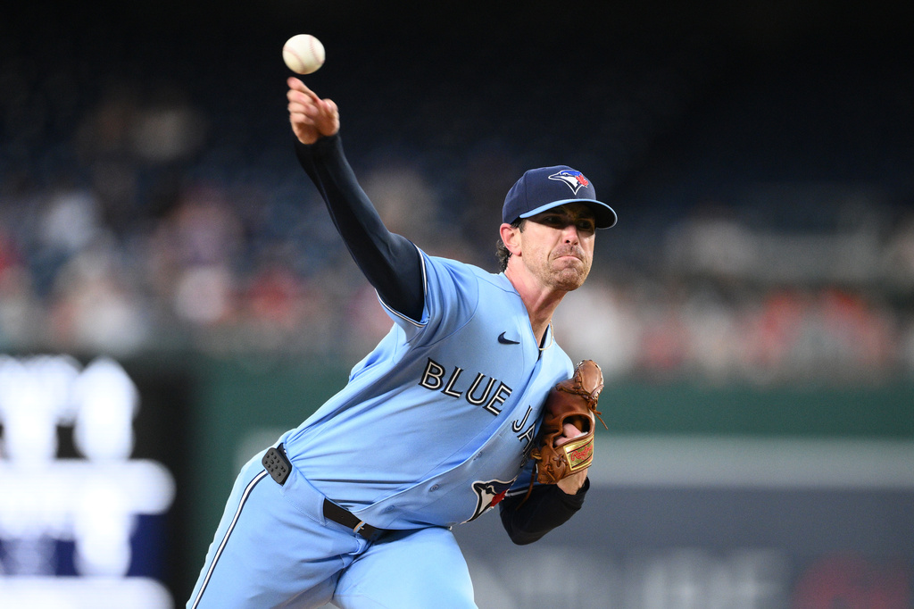 Toronto Blue Jays pitcher Shane Bieber throws during the first inning of a baseball game against the Washington Nationals, Tuesday, July 28, 2026, in Washington. (AP Photo/Nick Wass)