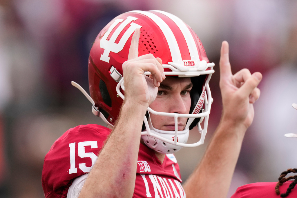 Indiana quarterback Fernando Mendoza (15) calls a play during the first half of the Rose Bowl College Football Playoff quarterfinal game Thursday, Jan. 1, 2026, in Pasadena, Calif. (AP Photo/Mark J. Terrill)