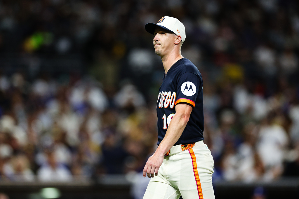 San Diego Padres' Walker Buehler looks on after being relieved in the sixth inning of a baseball game against the Los Angeles Dodgers, Friday, June 26, 2026, in San Diego. (AP Photo/Derrick Tuskan)