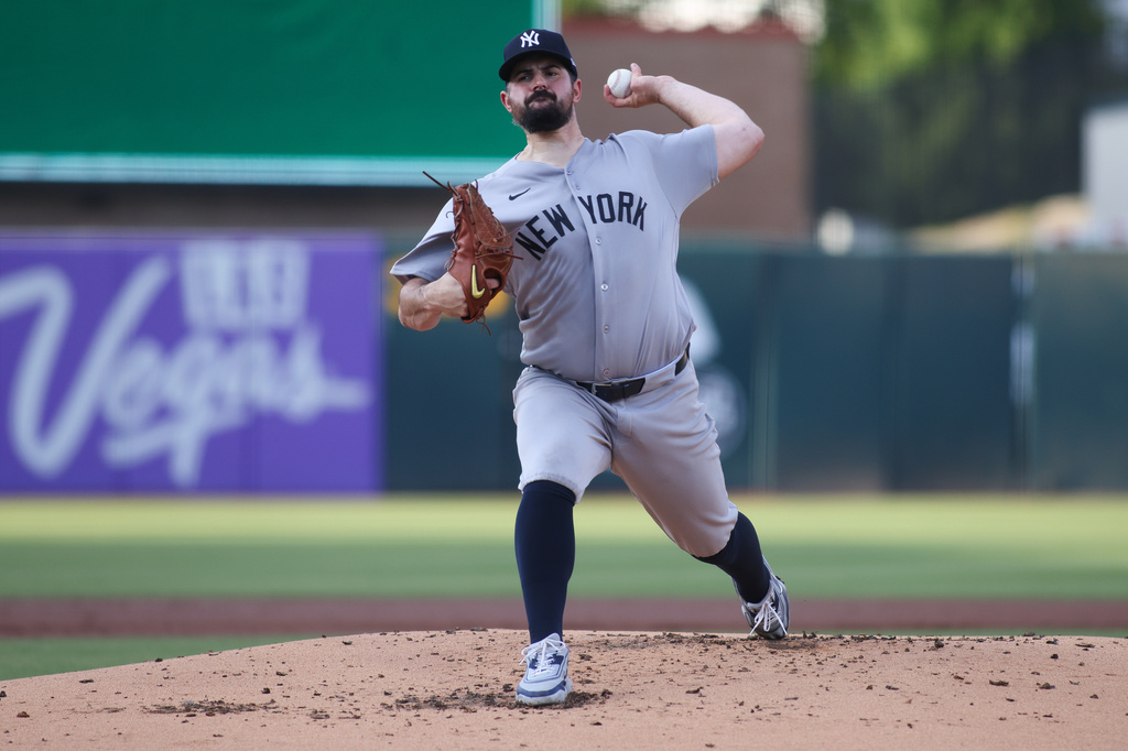 New York Yankees pitcher Carlos Rodón throws to an Athletics batter during the first inning of a baseball game Friday, May 29, 2026, in West Sacramento, Calif. (AP Photo/Scott Marshall)