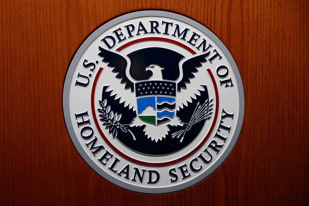 FILE - In this June 28, 2019, file photo the Department of Homeland Security (DHS) seal is seen during a news conference in Washington. (AP Photo/Carolyn Kaster, File)