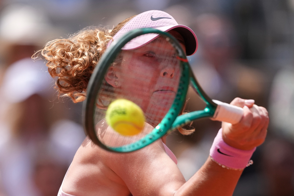 Russia's Mirra Andreeva returns during the final tennis match against Poland's Maja Chwalinska at the French Open in Paris, Saturday, June 6, 2026. (AP Photo/Thibault Camus)