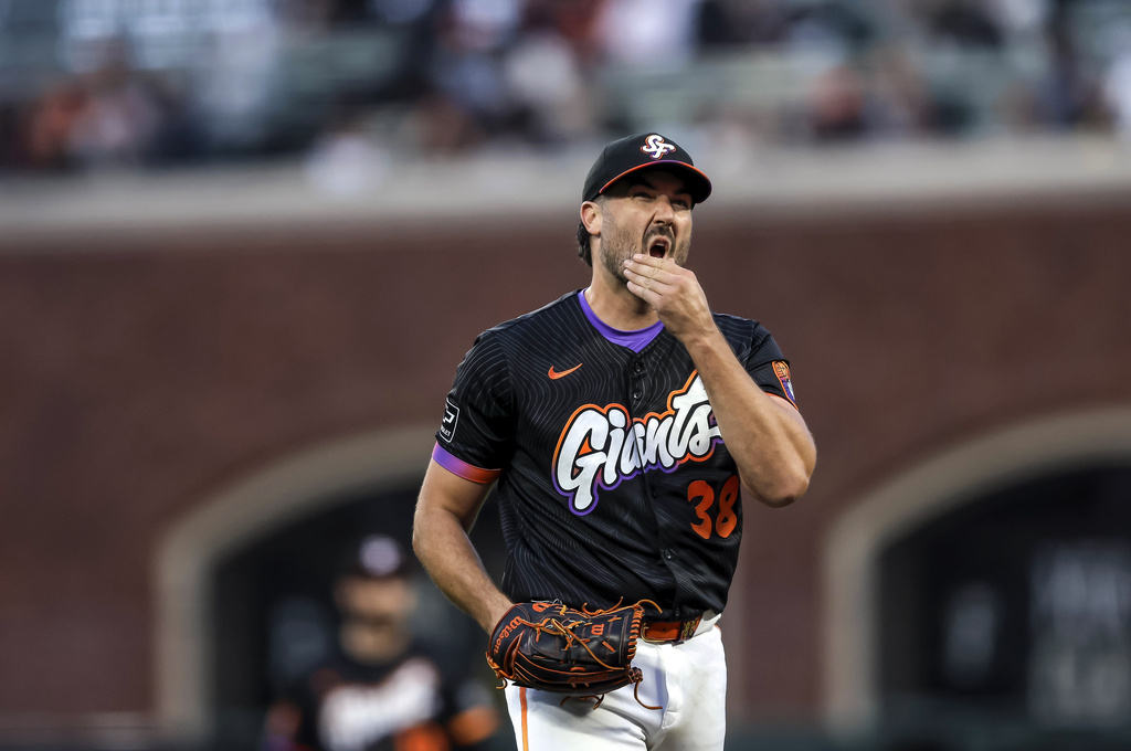 San Francisco Giants' Robbie Ray (38) reacts after giving up a two-run home run in the second inning of a baseball game against the San Diego Padres at Oracle Park in San Francisco, on Tuesday, Aug. 12, 2025. (Carlos Avila Gonzalez/San Francisco Chronicle via AP)