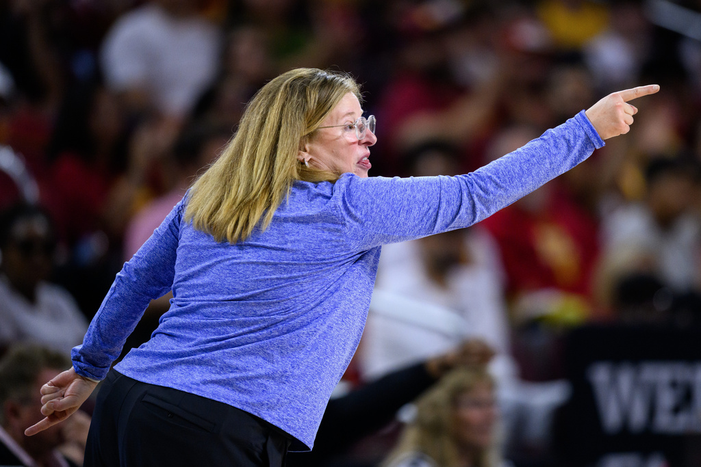 UCLA head coach Cori Close gestures during the first half of an NCAA college basketball game against Southern California, Sunday, March 1, 2026, in Los Angeles. (AP Photo/William Liang)