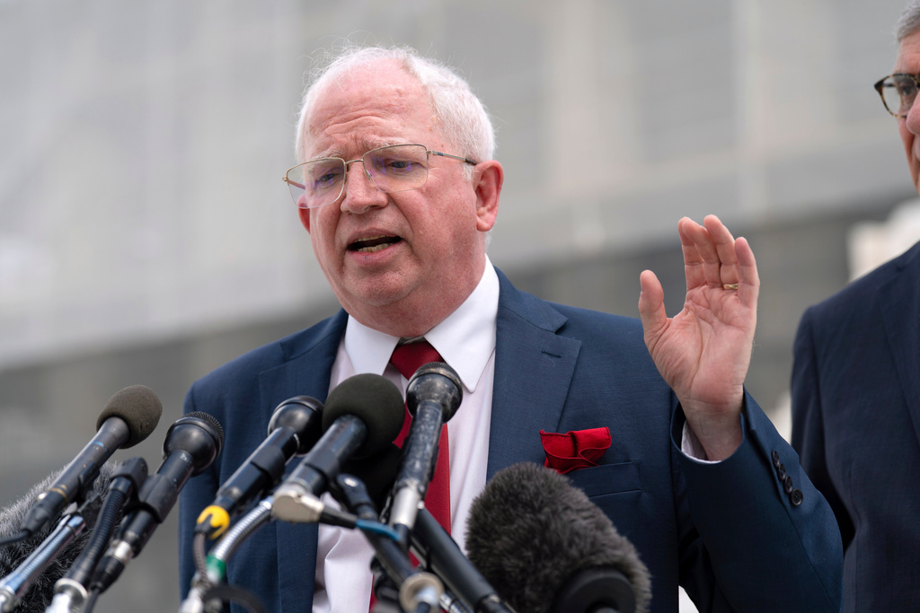 FILE - John Eastman, a California law professor, speaks to reporters after the Supreme Court hearing on Birthright Citizenship outside of the Supreme Court in Washington, May 15, 2025. (AP Photo/Jose Luis Magana, File)