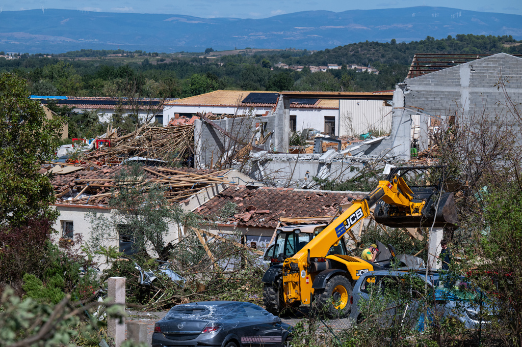 Damaged houses are pictured after a tornado ravaged the small village of Pomas in southern France, leaving dozens injured, Tuesday Aug. 25, 2026. (AP Photo/Frederic Lancelot)