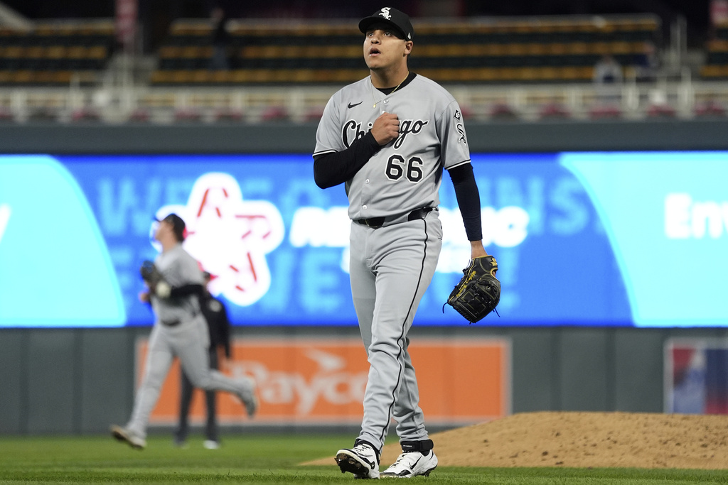 Chicago White Sox relief pitcher Wikelman González (66) walks back to the dugout after forcing the final out of the bottom of the seventh inning of a baseball game against the Minnesota Twins Thursday, Sept. 4, 2025, in Minneapolis. (AP Photo/Abbie Parr)