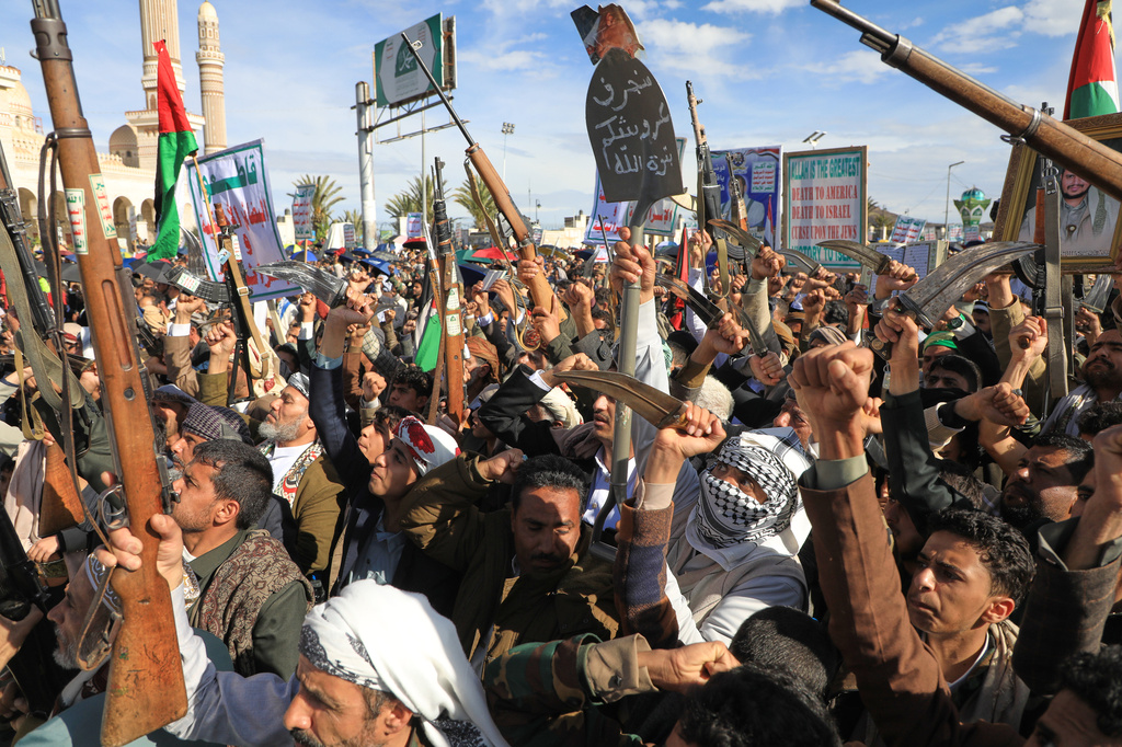 Houthi supporters shout slogans during a rally against Israel and the United States' war in Iran, in Sanaa, Yemen, Friday, March 27, 2026. (AP Photo/Osamah Abdulrahman)