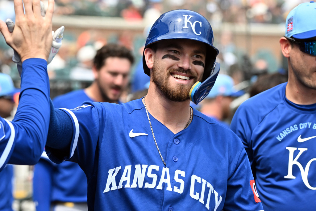 Kansas City Royals' Nick Loftin is congratulated after hitting a home run during the ninth inning of a baseball game against the Detroit Tigers, Saturday, July 25, 2026, in Detroit. (AP Photo/Jose Juarez)