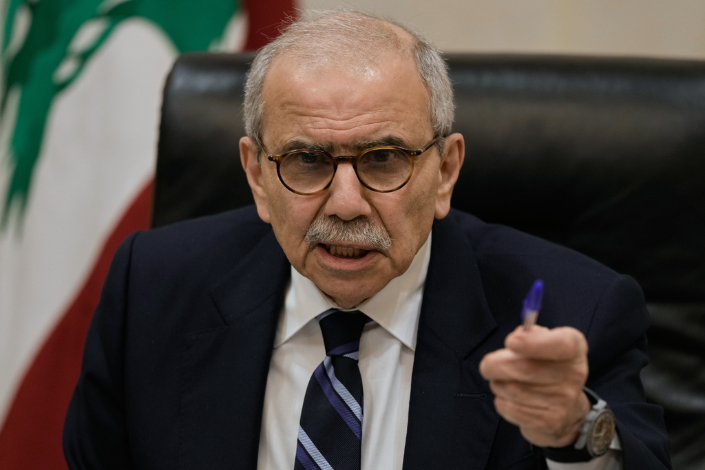 Lebanese Prime Minister Nawaf Salam speaks to journalists working for foreign media and news agencies at the government palace in Beirut, Wednesday, Dec. 3, 2025. (AP Photo/Bilal Hussein)