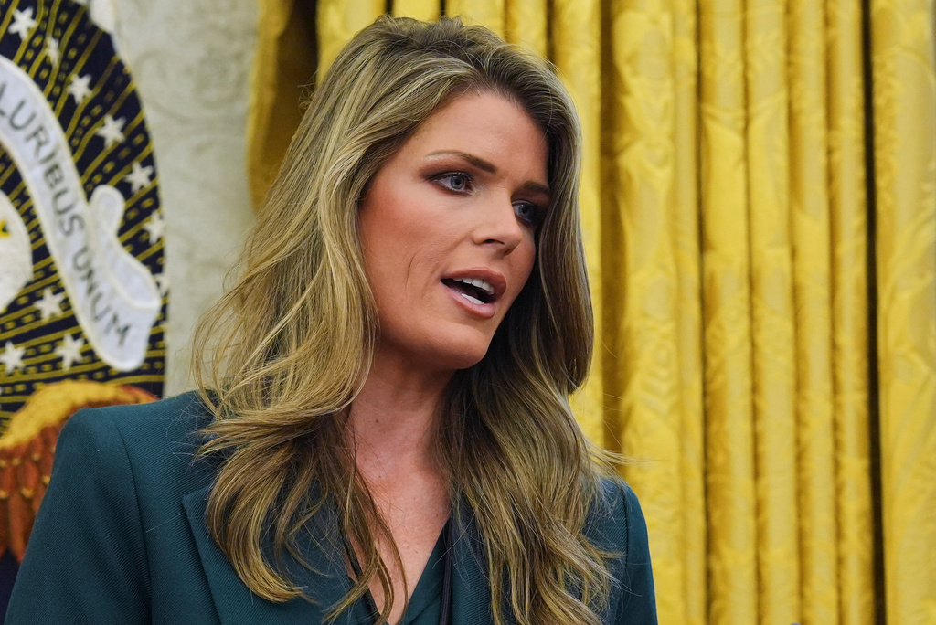 FILE - Lindsey Halligan speaks as President Donald Trump signs executive orders in the Oval Office of the White House, Friday, Jan. 31, 2025, in Washington. (AP Photo/Evan Vucci, File)