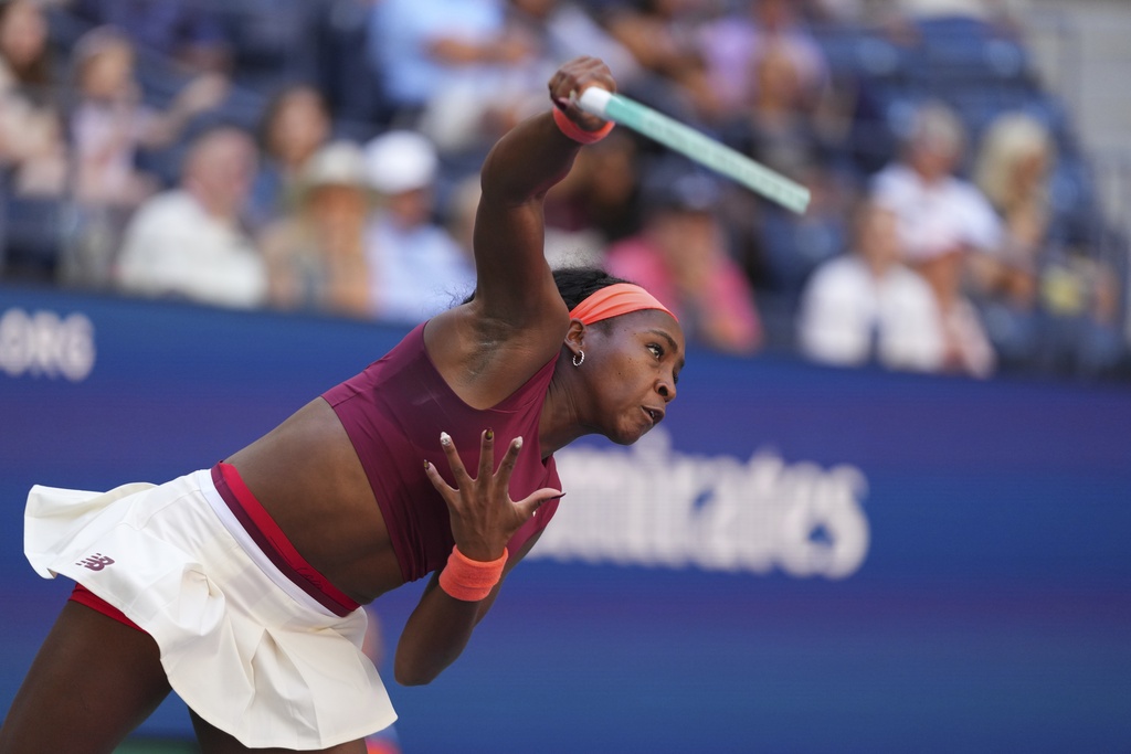 Coco Gauff, of the United States, serves during the third round of the U.S. Open tennis championships, Saturday, Aug. 30, 2025, in New York. (AP Photo/Kirsty Wigglesworth)