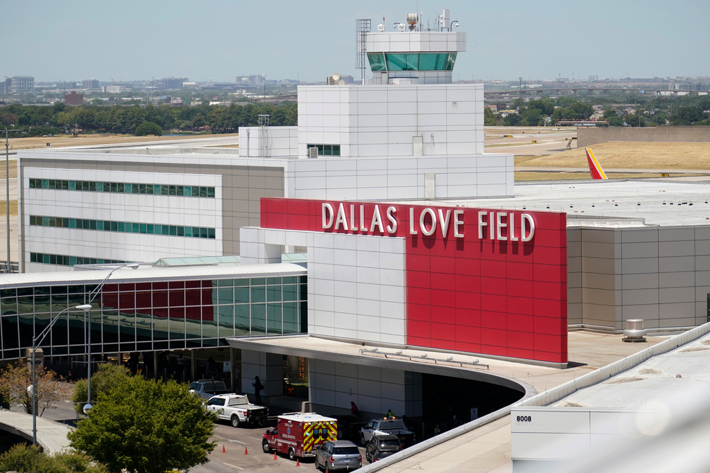 FILE - The main entrance of Dallas Love Field in Dallas is seen on Monday, July 25, 2022. (AP Photo/Tony Gutierrez, File)