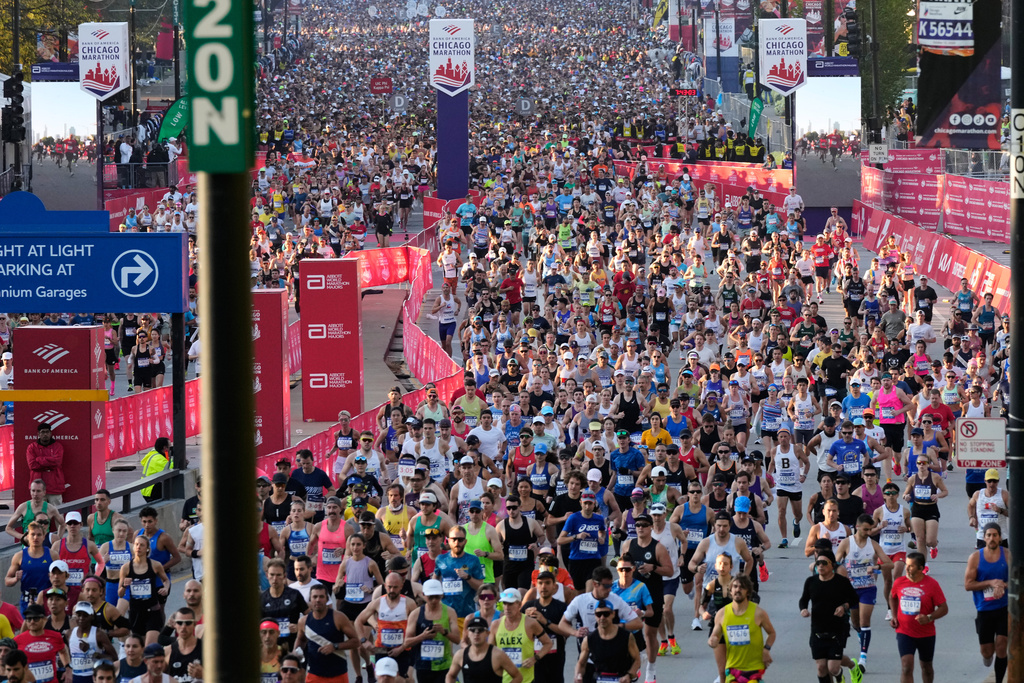 Runners participate in the Chicago Marathon, Sunday, Oct. 12, 2025. (AP Photo/Nam Y. Huh)