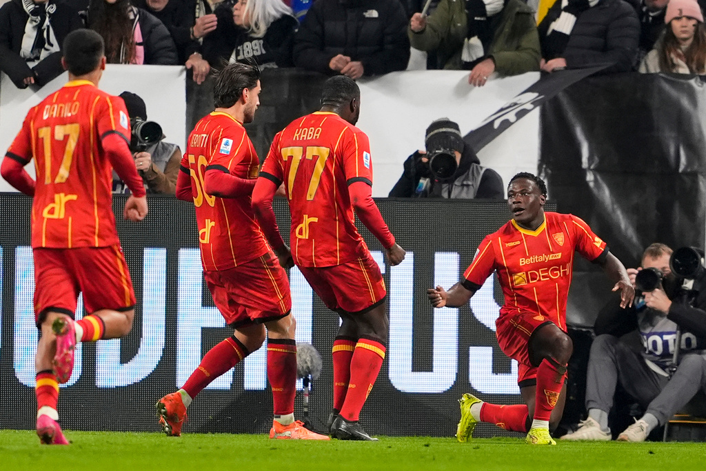 Lecce's Lameck Banda, right, celebrates scoring with teammates during the Serie A soccer match between Juventus and Lecce in Turin, Italy, Saturday Jan. 3, 2026. (Fabio Ferrari/LaPresse via AP)