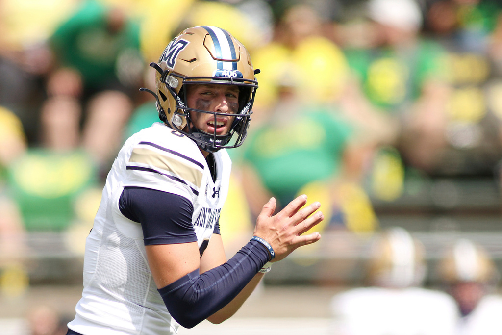 FILE - Montana State quarterback Justin Lamson (8) and running back Adam Jones (23) warm up before an NCAA college football game against Oregon, Saturday, Aug. 30, 2025, in Eugene, Ore. (AP Photo/Lydia Ely, File)