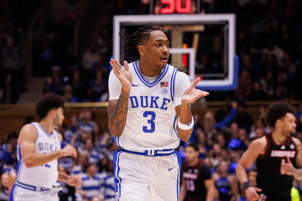 Duke's Isaiah Evans (3) reacts after a play during the first half of an NCAA college basketball game against Louisville in Durham, N.C., Monday, Jan. 26, 2026. (AP Photo/Ben McKeown)