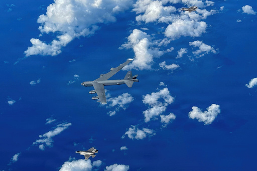 In this image provided by the U.S. Air Force, A Marine Corps F-35B Lightning II aircraft flies alongside a U.S. Air Force B-52H Stratofortress bomber in the U.S. Southern Command area of responsibility, Oct. 15, 2025. (U.S. Air Force via AP) In this image provided by the U.S. Air Force, A Marine Corps F-35B Lightning II aircraft flies alongside a U.S. Air Force B-52H Stratofortress bomber in the U.S. Southern Command area of responsibility, Oct. 15, 2025. (U.S. Air Force via AP)