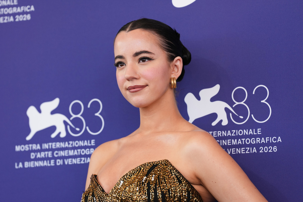 Ashley St. Clair poses for photographers at the photo call for the documentray film 'Musk' during the 83rd edition of the Venice Film Festival in Venice, Italy, on Tuesday, Sept. 8, 2026. (Photo by Scott A Garfitt/Invision/AP)