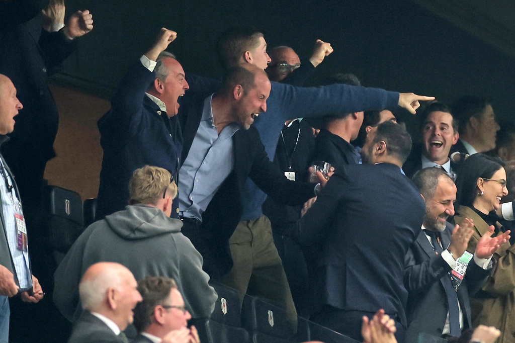 Britain's Prince William, center, celebrates as he watches the Europa League final soccer match between Freiburg and Aston Villa in Istanbul, Turkey, Wednesday, May 20, 2026. (AP Photo)