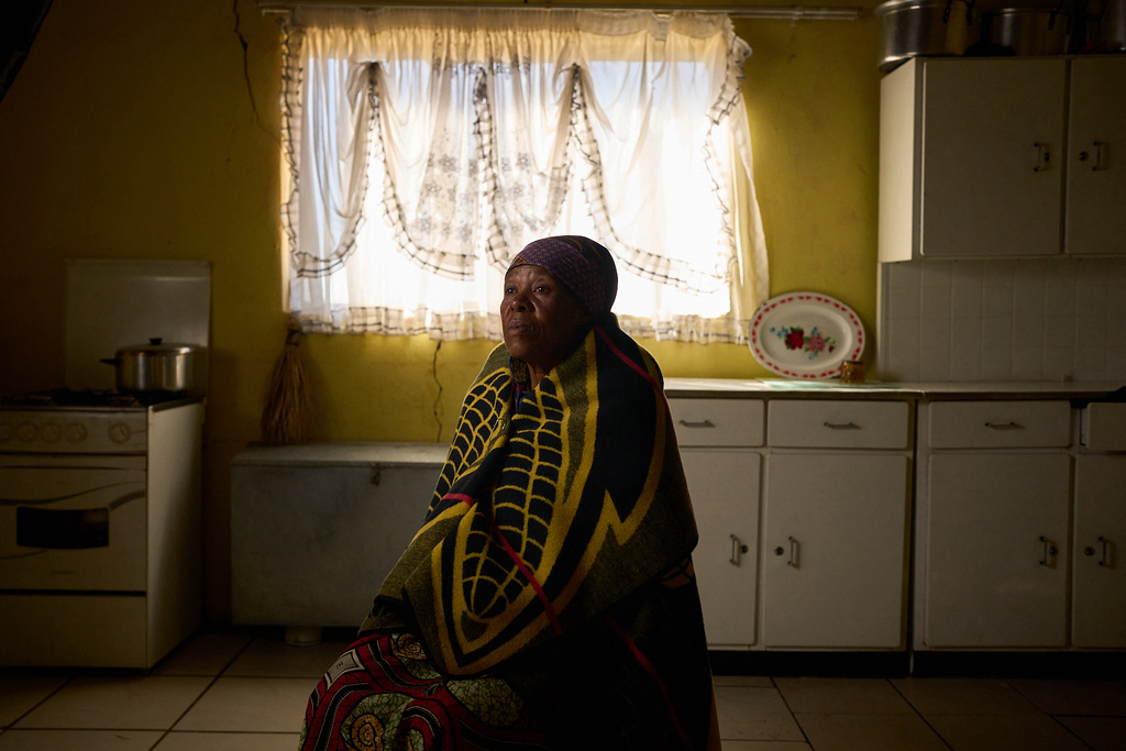 Mapapali Mosoeunyane, 62, poses for a portrait inside her home in Mafeteng, Lesotho, July 12, 2025.