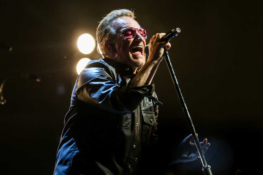 FILE - Bono of U2 performs at the Innocence + Experience Tour at The Forum in Inglewood, Calif., on May 26, 2015. (Photo by Rich Fury/Invision/AP, File)