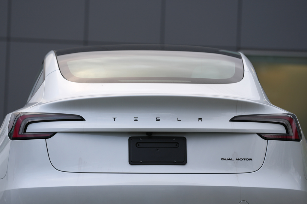 FILE - A Tesla vehicle is seen at a Tesla facility Wednesday, April 15, 2026, in Portland, Ore. (AP Photo/Jenny Kane, File)