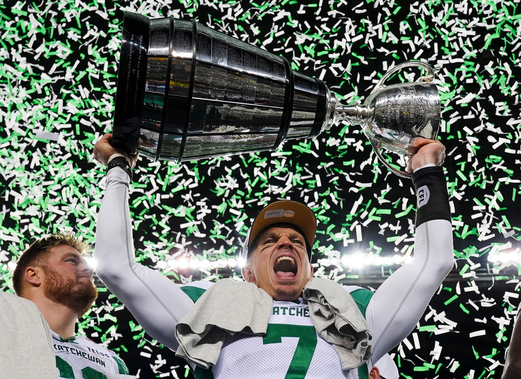 Saskatchewan Roughriders quarterback Trevor Harris (7) celebrates his team's win over the Montreal Alouettes in the CFL Grey Cup football game in Winnipeg, Manitoba, Sunday, Nov. 16, 2025. (Frank Gunn/The Canadian Press via AP)