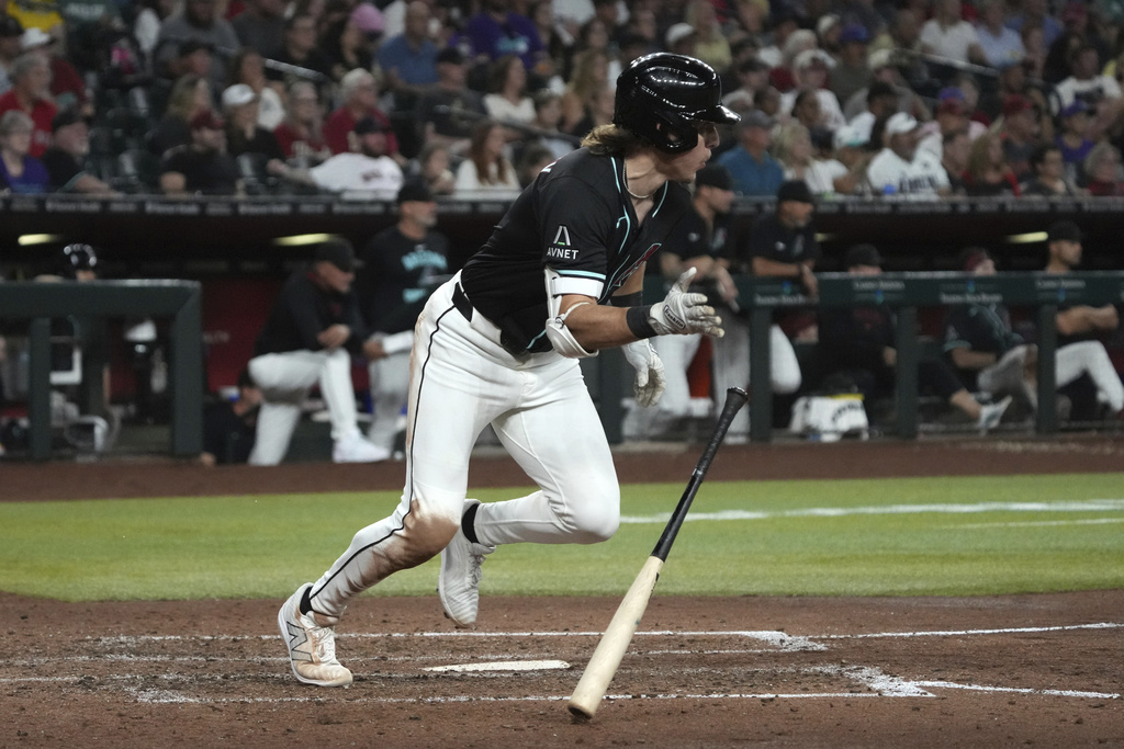 CORRECTS TO SATURDAY INSTEAD OF SUNDAY - Arizona Diamondbacks' Jake McCarthy starts to run after hitting an RBI single against the Boston Red Sox in the fourth inning of a baseball game, Saturday, Sept 6, 2025, in Phoenix. (AP Photo/Rick Scuteri)
