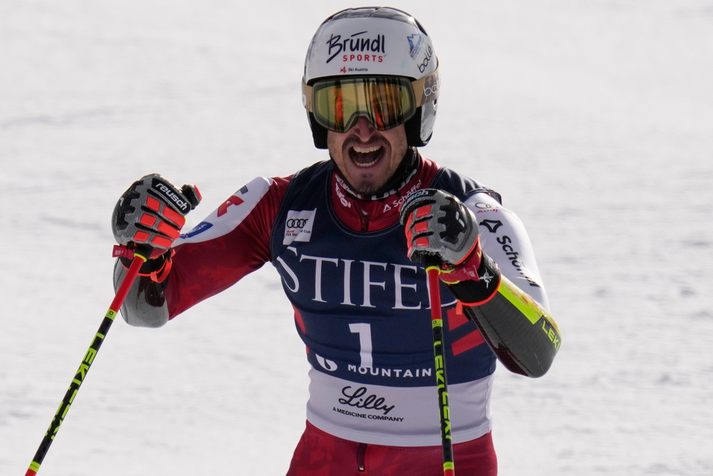 Austria's Stefan Brennsteiner celebrates after his run during a World Cup men's giant slalom skiing race, Friday, Nov. 28, 2025, in Copper Mountain. (AP Photo/John Locher)