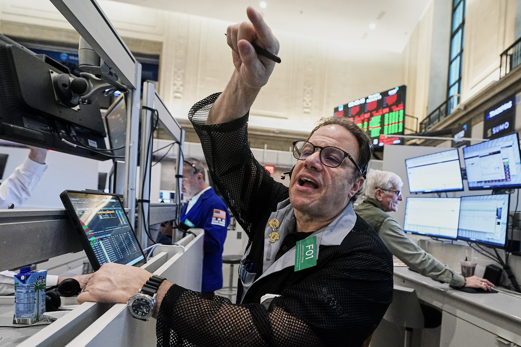 Options trader Anthony Spina works on the floor of the New York Stock Exchange, Thursday, Feb. 19, 2026. (AP Photo/Richard Drew)