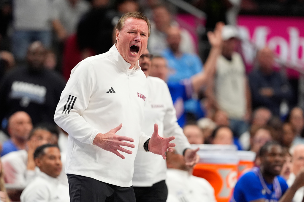Kansas head coach Bill Self yells from the sidelines during the first half of an NCAA college basketball game against Houston in the semifinal round of the Big 12 Conference tournament Friday, March 13, 2026, in Kansas City, Mo. (AP Photo/Charlie Riedel)