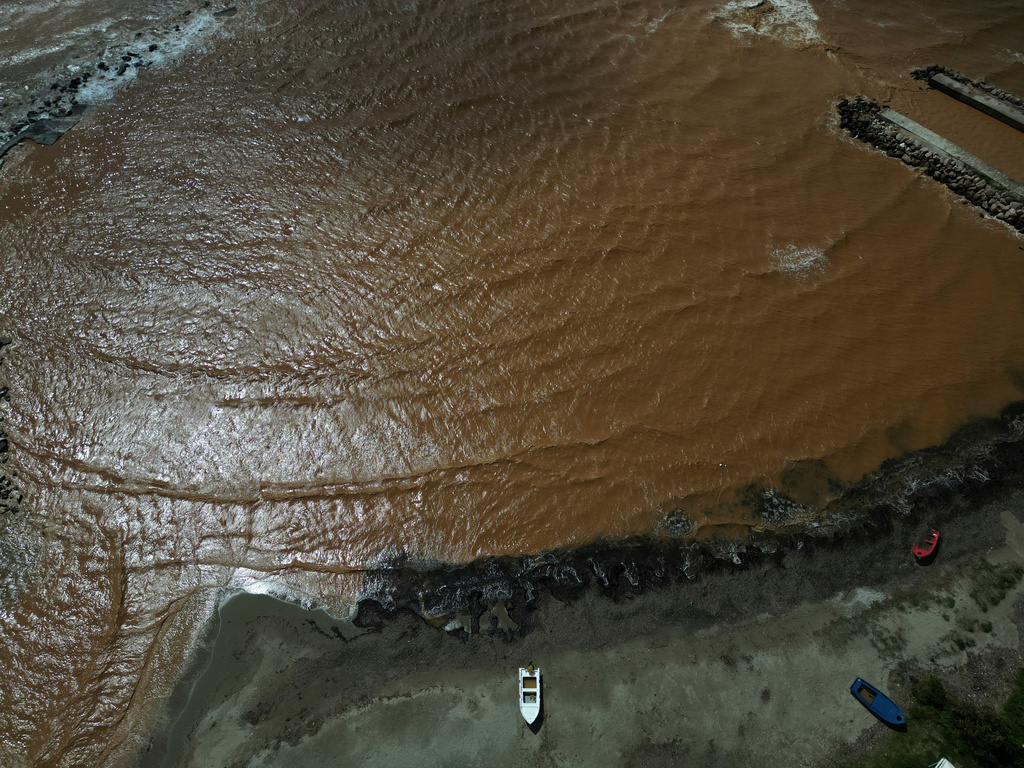 The beach in Marathon, east of Athens, Greece, is seen on Thursday, April 2, 2026, after heavy overnight storms caused extensive damage. (AP Photo/Thanassis Stavrakis)