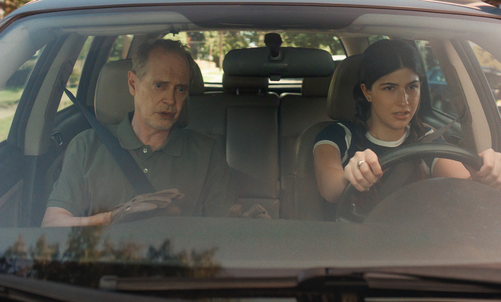 This image released by Netflix shows Steve Buscemi, left, and Sunny Sandler in a scene from "Don't Say Good Luck." (Netflix via AP)