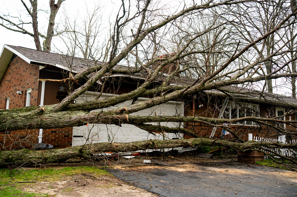 Damage from a severe storm is seen on Oak Street in Otesgo, Mich., on Wednesday, April 15, 2026. (Devin Anderson-Torrez /Kalamazoo Gazette via AP)
