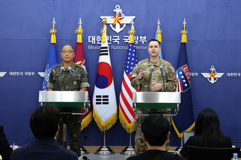 Col. Lee Sung-jun, left, public affairs director of South Korea's Joint Chiefs of Staff and Col. Ryan Donald, public affairs director of the United Nations Command (UNC), Combined Forces Command (CFC), and United States Forces Korea (USFK) attend a press briefing of Ulchi Freedom Shield 2025 exercise at the Defense Ministry in Seoul Thursday, Aug. 7, 2025. (Chung Sung-Jun/Pool Photo via AP)