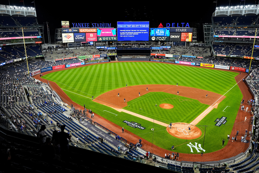 FILE - The grounds crew grooms the field before Game 3 of baseball's American League Division Series between the New York Yankees and the Toronto Blue Jays, Tuesday, Oct. 7, 2025, in New York. (AP Photo/Yuki Iwamura, File)