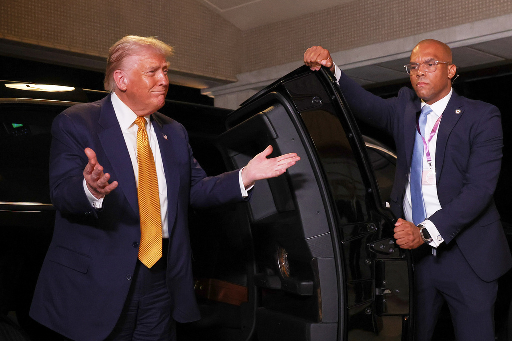 President Donald Trump, left, and Japan's Emperor Naruhito talk during their meeting at the Imperial Palace in Tokyo, Oct. 27, 2025. (Issei Kato/Pool Photo via AP)