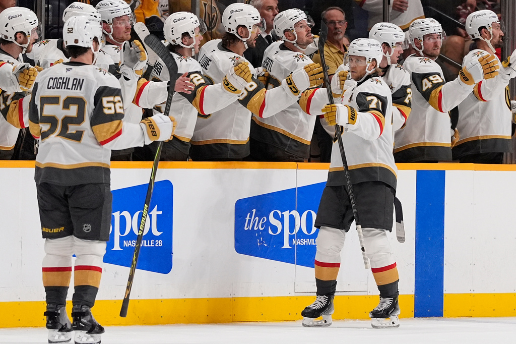 Vegas Golden Knights center William Karlsson (71) celebrates his goal with teammates during the second period of an NHL hockey game against the Nashville Predators, Tuesday, Oct. 13, 2026, in Nashville, Tenn. (AP Photo/George Walker IV)