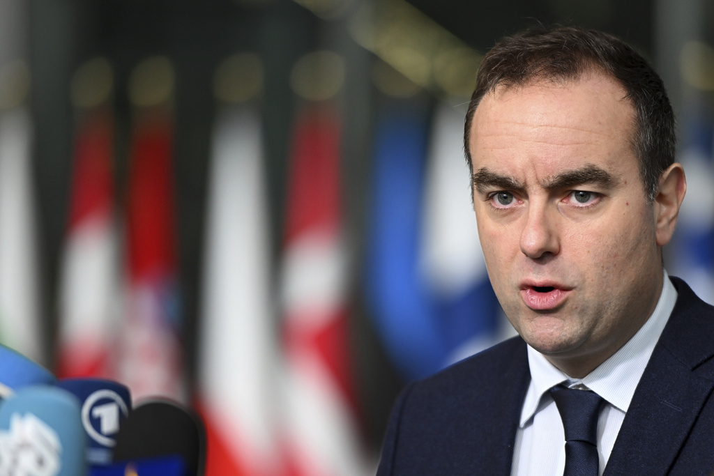 FILE - French Defense Minister Sebastien Lecornu speaks with the media as he arrives for a meeting of NATO defense ministers at NATO headquarters in Brussels, Feb. 13, 2025. (AP Photo/Harry Nakos, File)