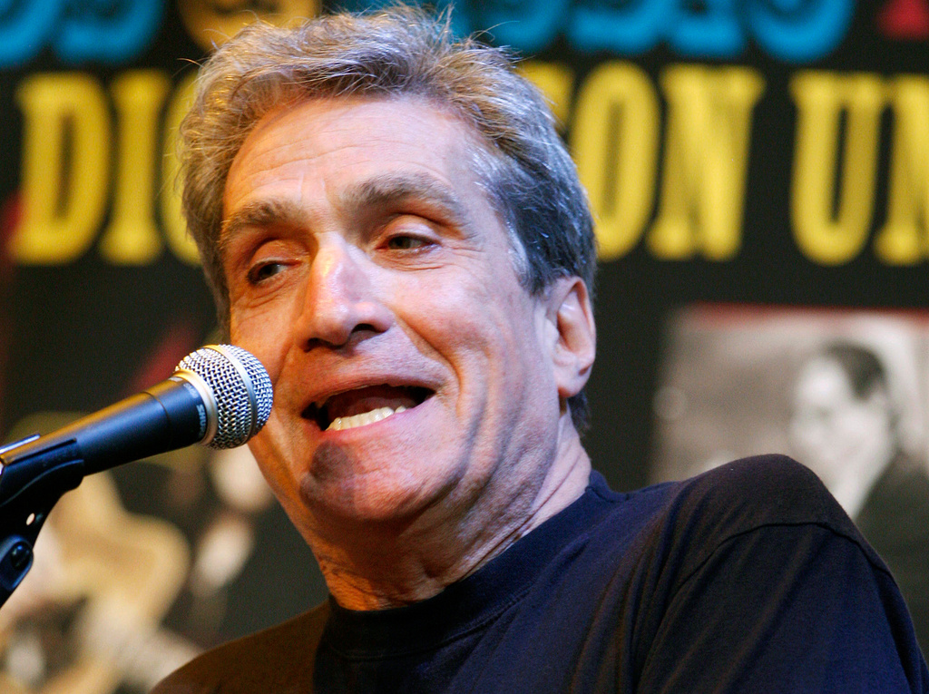 FILE - Former U.S. poet laureate Robert Pinsky recites one of his poems on stage at Fairleigh Dickinson University in Madison, N.J., on May 6, 2010. (AP Photo/Mel Evans, File)