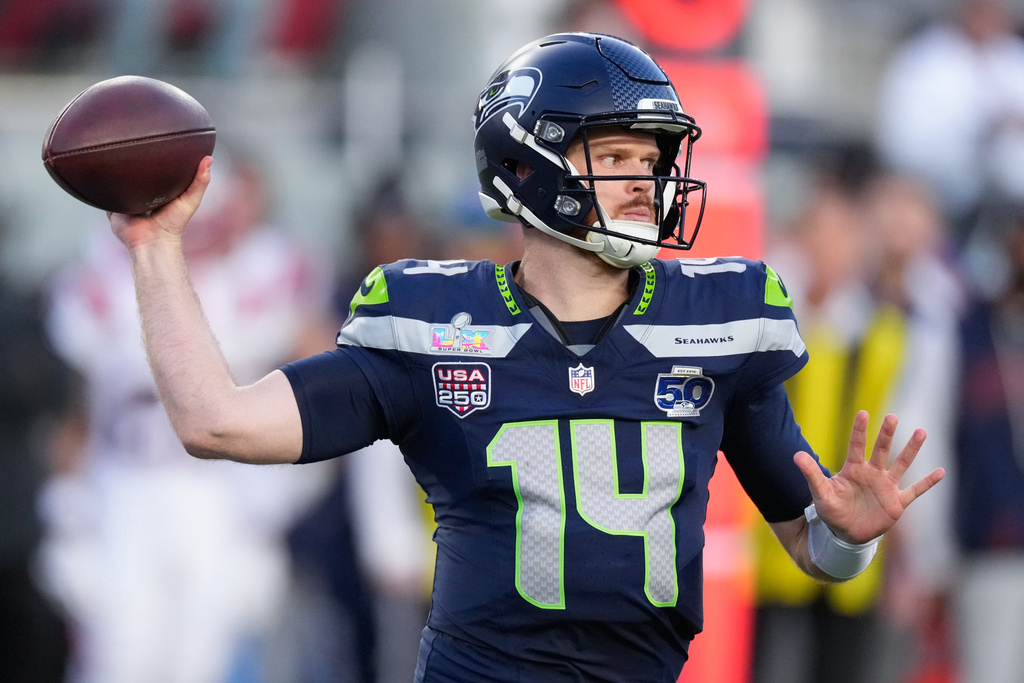 Seattle Seahawks quarterback Sam Darnold throws a pass during the first half of the NFL Super Bowl 60 football game against the New England Patriots, Sunday, Feb. 8, 2026, in Santa Clara, Calif. (AP Photo/Mark J. Terrill)