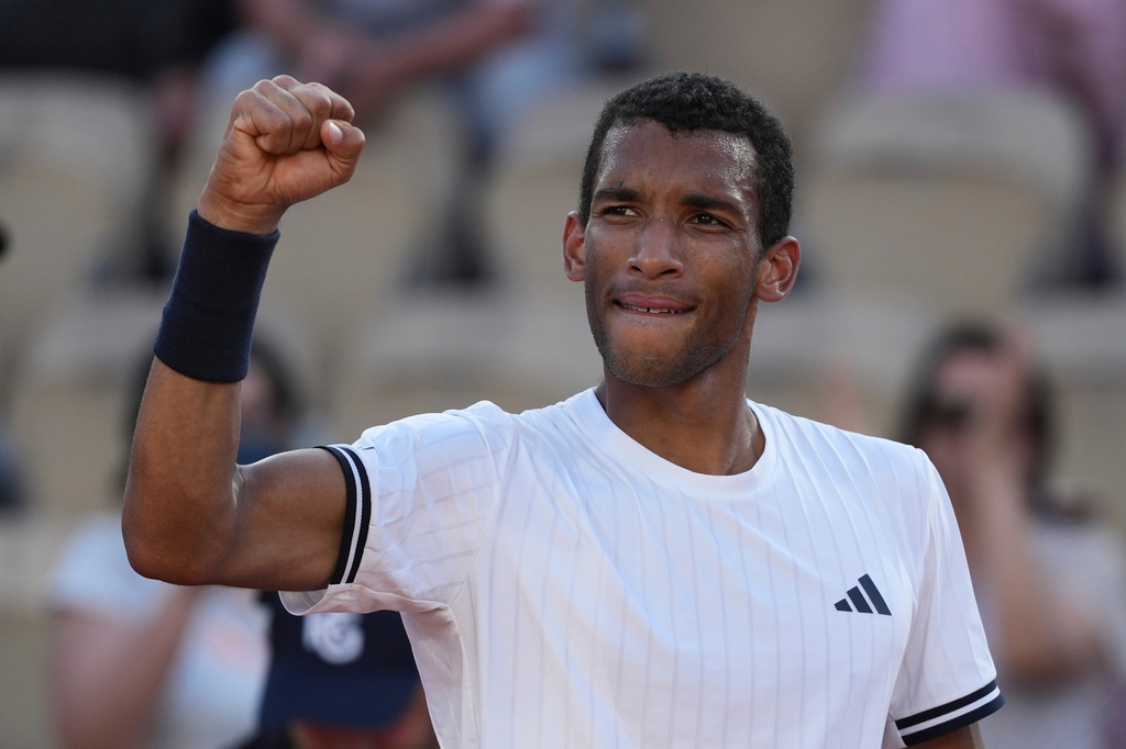 Felix Auger-Aliassime of Canada celebrates after winning the second round men's singles tennis match against Roman Andres Burruchaga of Argentina at the French Open tennis tournament in Paris, Thursday, May 28, 2026. (AP Photo/Thibault Camus)